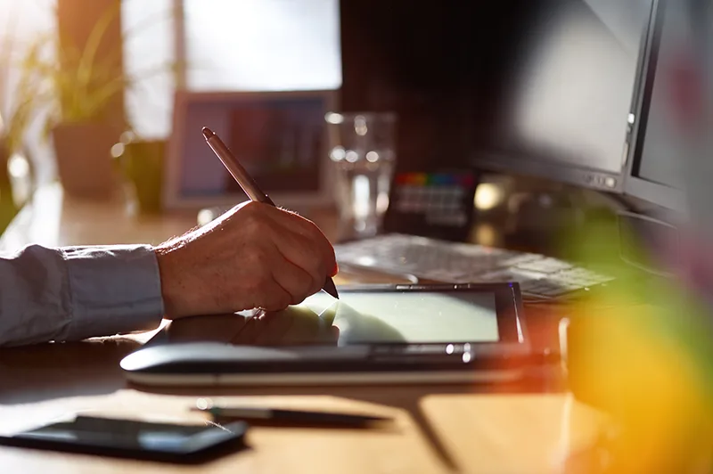 DesignerWithTablet HTML Email Best Practices: Are Image-Only Emails Bad for Marketing?